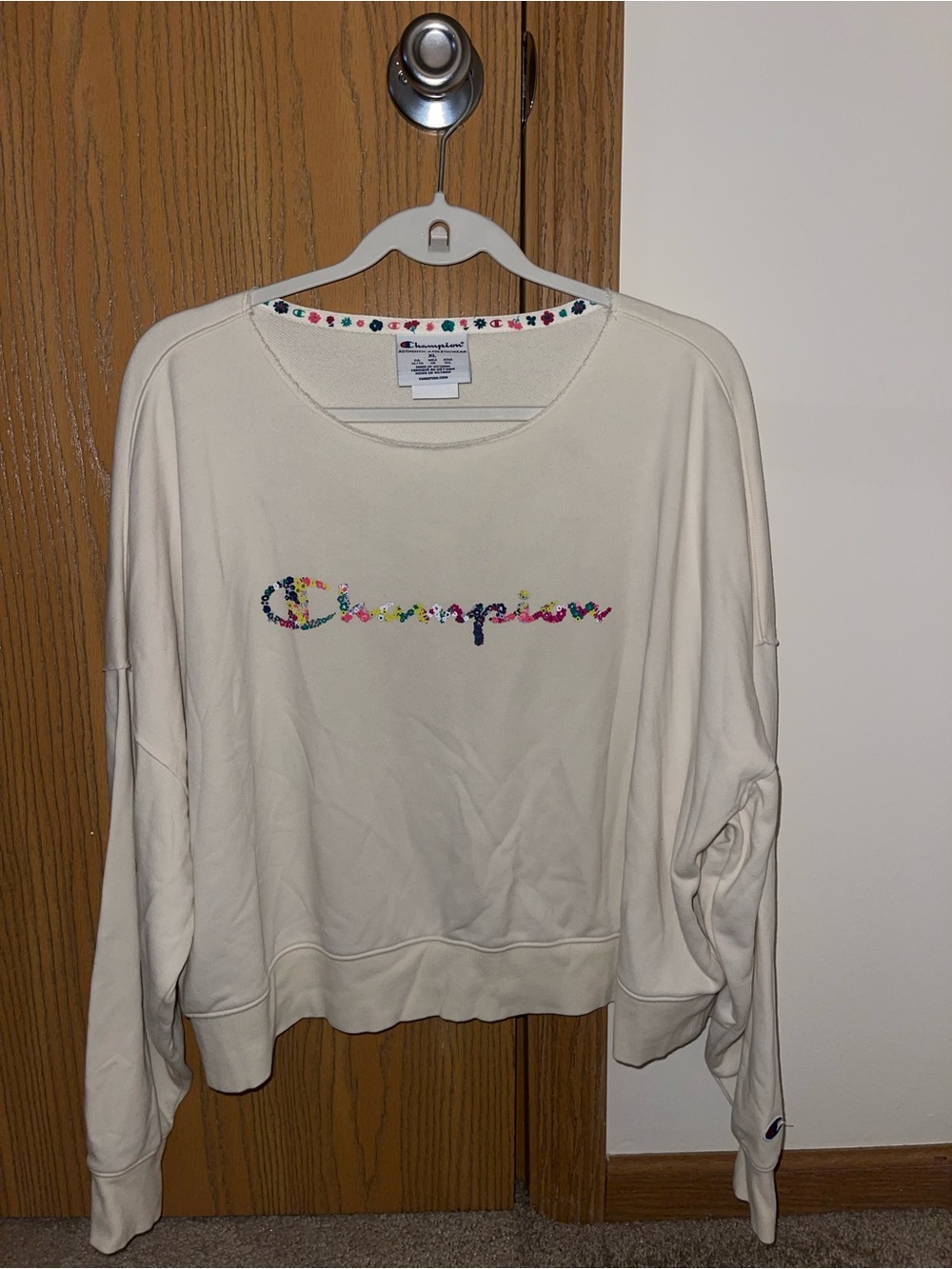 Champion Women's Cream Crewneck off the shoulder Sweatshirt with Floral Logo